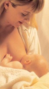 Mom breastfeeding newborn