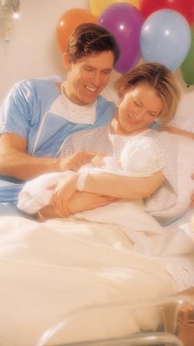 Parents with newborn in hospital