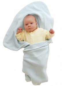 Baby swaddled in blanket