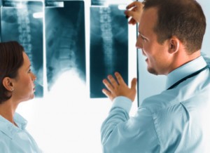 Surgeon consulting about back surgery