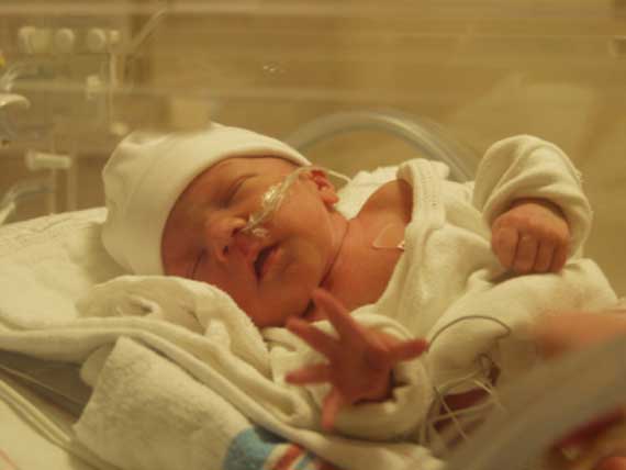 Preemie boy in incubaor