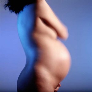 Side view of pregnant woman