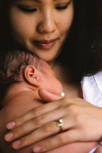 Asian mother with newborn