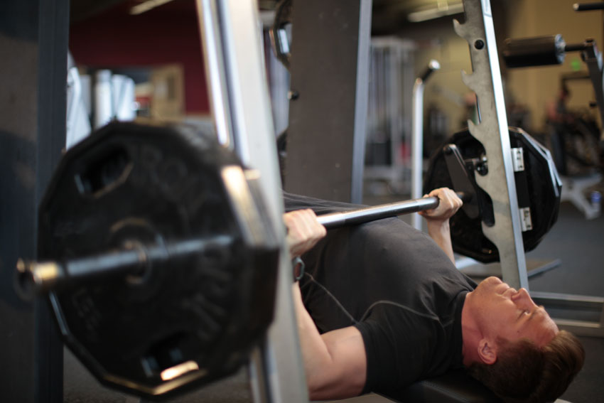 Barbell vs Smith Machine Bench Press The Pro's & Con's of Each